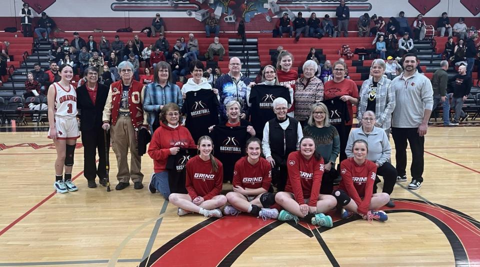 The current Onaway girls basketball program honored the 1973 Cardinals, one of only two district champions in program history, during a ceremony following Friday's victory over Bellaire.