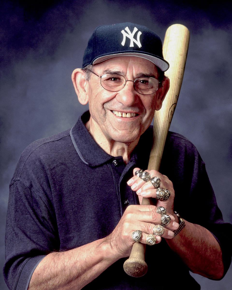 MONTCLAIR, NEW JERSEY - NOVEMBER 10: New York Yankees Great, Yogi Berra poses for photos with his 10 World Series rings at Yogi Berra Museum on November 10, 2000 in Montclair, New Jersey. (Photo by Steve Crandall/Getty Images)