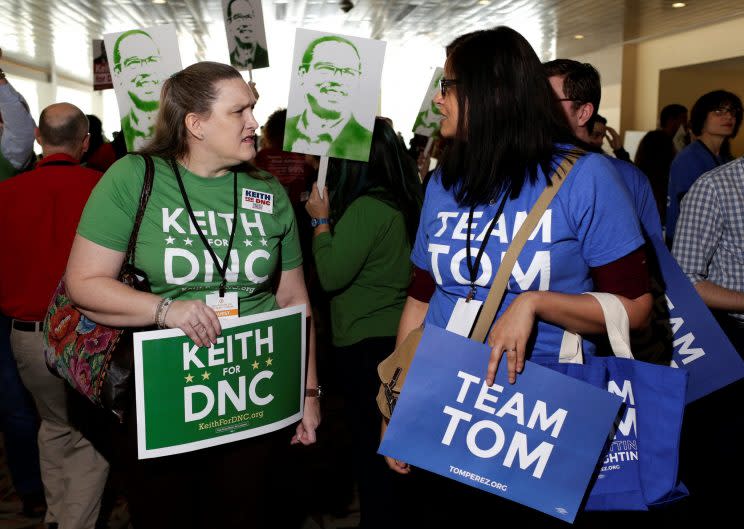 Supporters of Rep. Keith Ellison and former Secretary of Labor Tom Perez speak to each other during a Democratic National Committee forum in Baltimore. (Photo: Joshua Roberts/Reuters)