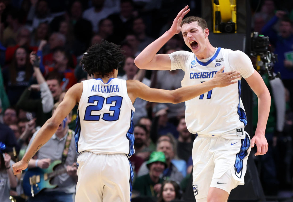 DENVER, COLORADO - MARCH 17: Ryan Kalkbrenner #11 of the Creighton Bluejays reacts after a dunk during the second half against the North Carolina State Wolfpack in the first round of the NCAA Men's Basketball Tournament at Ball Arena on March 17, 2023 in Denver, Colorado. (Photo by Sean M. Haffey/Getty Images)