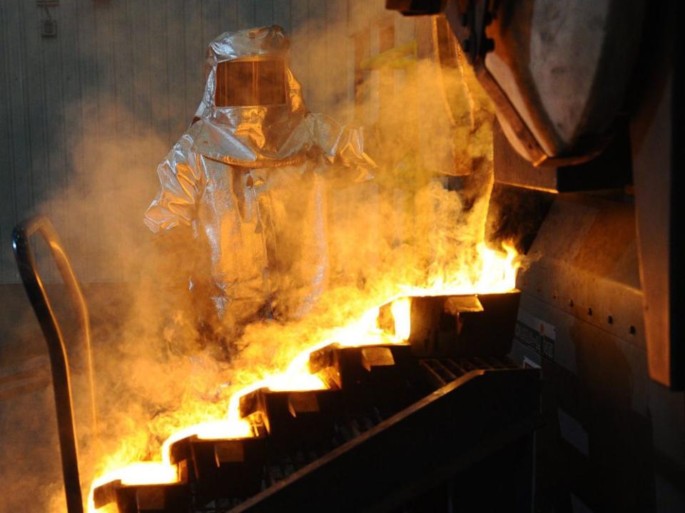  A refiner pours bars of gold at Agnico-Eagle Mines Ltd.’s Meadowbank mine facility in Nunavut.