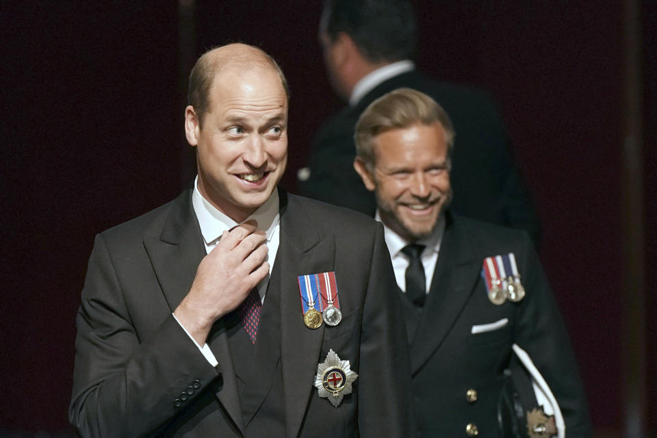 Britain's Prince William, left, leaves after the State Opening of Parliament in the House of Lords at the Palace of Westminster, in London, Tuesday, May 10, 2022. Britain’s Parliament is opening a new year-long session with Prime Minister Boris Johnson trying to re-energize his scandal-tarnished administration and address the U.K.’s worsening cost-of-living crisis. (Aaron Chown/Pool Photo via AP)