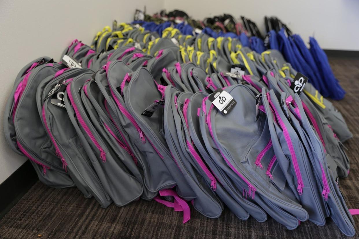 TCC and Wireless Zone give away thousands of backpacks filled with school supplies at select locations in 2022.