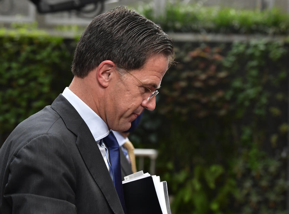 Dutch Prime Minister Mark Rutte arrives for an EU summit at the European Council building in Brussels, Sunday, July 19, 2020. Leaders from 27 European Union nations meet face-to-face for a third day to assess an overall budget and recovery package spread over seven years estimated at some 1.75 trillion to 1.85 trillion euros. (John Thys, Pool Photo via AP)