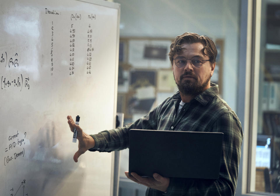 This image released by Netflix shows Leonardo DiCaprio in "Don't Look Up." (Niko Tavernise/Netflix via AP)