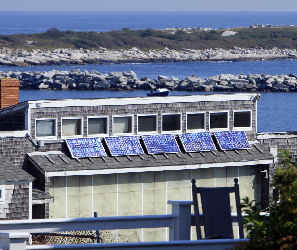 In this photo taken Friday, Sept. 14, 2012, solar panels are seen at the historic Star Island Family Retreat and Conference Center at the Isle of Shoals in Rye, N.H. The hotel 10 miles off the coast of New Hampshire wants to establish itself as an environmental leader. The island is essentially a self-contained system, and it is an ideal spot to showcase energy innovations and could be become a model for other communities. (AP Photo/Jim Cole)