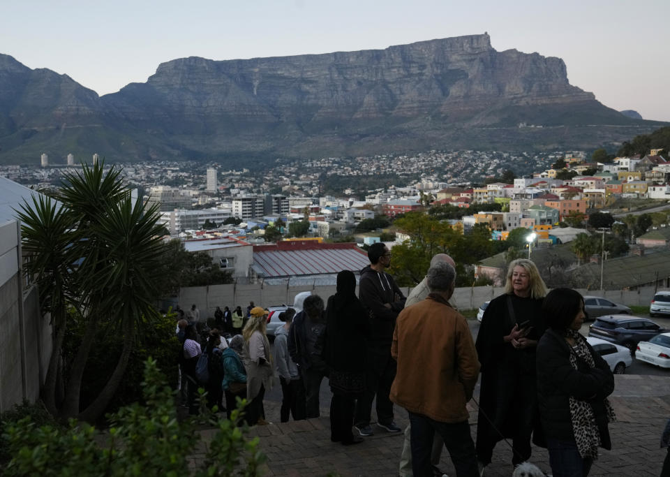 People queue to cast their votes at a polling station during general elections, in Cape Town, South Africa, Wednesday, May 29, 2024. South Africans have begun voting in an election seen as their country's most important in 30 years, and one that could put their young democracy in unknown territory. (AP Photo/Nardus Engelbrecht)