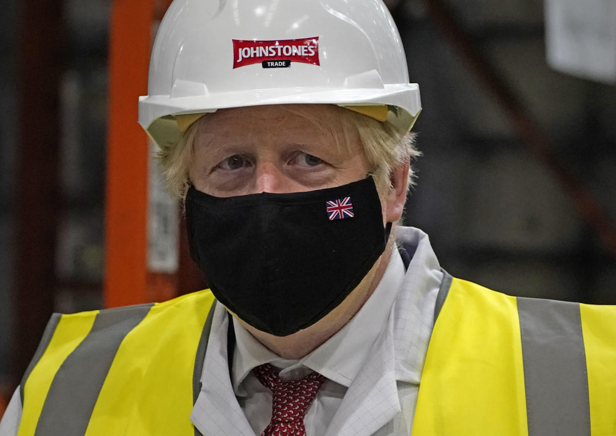 Prime Minister Boris Johnson during a visit to Johnstone's Paints Limited in Batley, West Yorkshire, ahead of the Batley and Spen by-election on July 1. Picture date: Monday June 28, 2021. (Photo by Peter Byrne/PA Images via Getty Images)