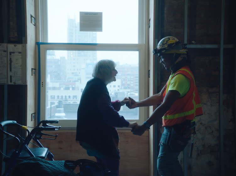 Choreographer Merle Lister dances with a construction worker - Credit: Magnolia Pictures/Clindoeil Films