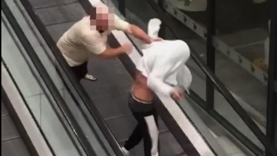 The wild brawl broke out between two men on a shopping centre escalator. Picture: Facebook.