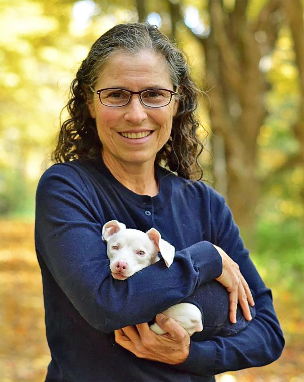 Melissa Shapiro posing with Piglet the Dog
