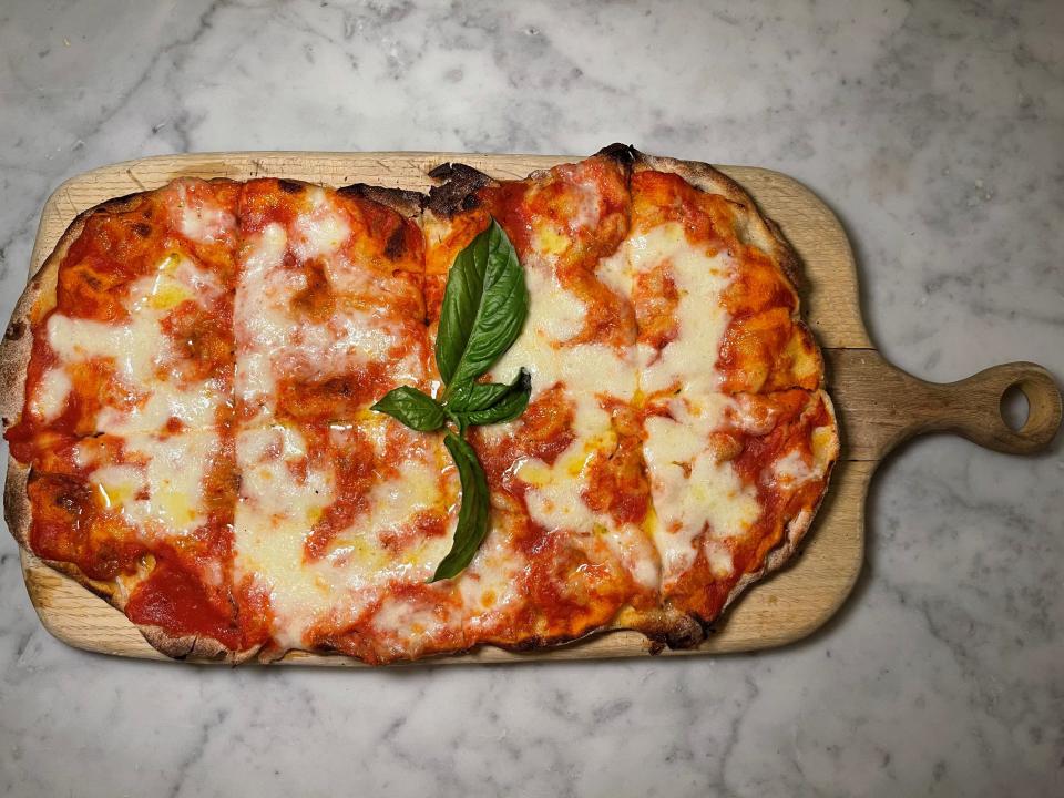 Margherita pizza from TVB by: Pax Romana in White Plains. This Pinsa Romana uses the same flour imported from Rome and is a blend of soy, wheat, rice, and sourdough flour.