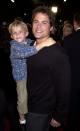 <p>Rob Lowe gives his son, John Owen, a lift at the premiere of Harry Potter and The Sorcerer's Stone in Los Angeles in 2001. </p>