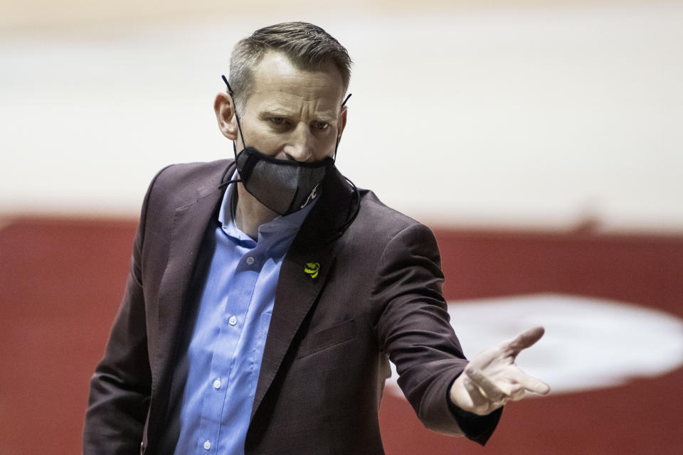 Alabama head coach Nate Oats signals his team during the first half of an NCAA basketball game against Vanderbilt on Saturday, Feb. 20, 2021, in Tuscaloosa, Ala. (AP Photo/Vasha Hunt)