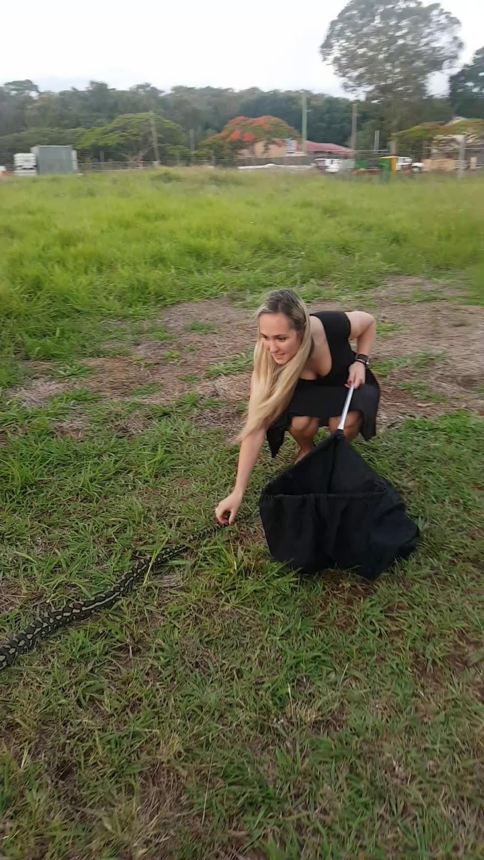 A woman has been hailed the most glamorous snake catcher in the world. Photo: Caters News