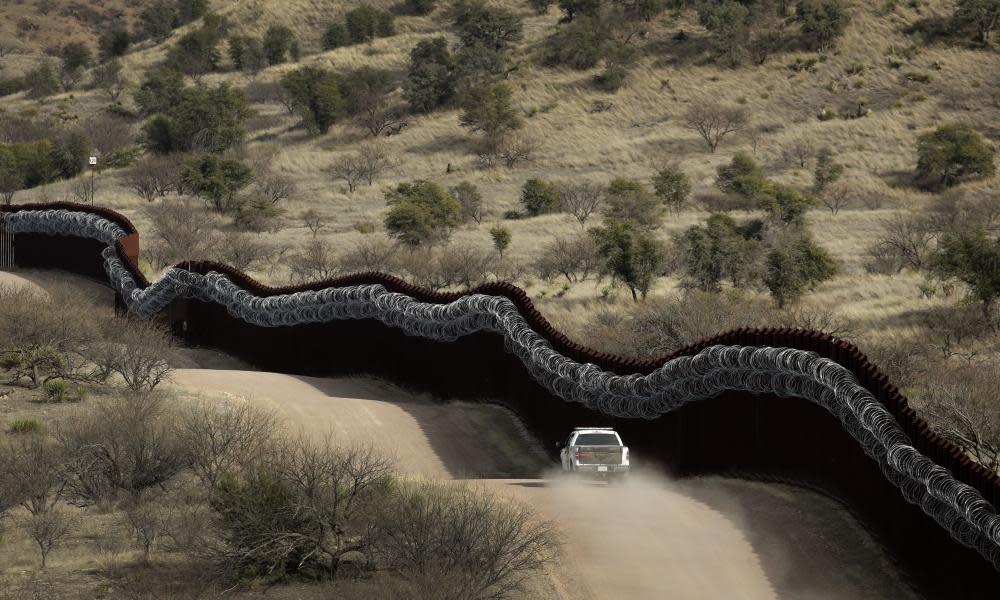 <span>Photograph: Charlie Riedel/AP</span>