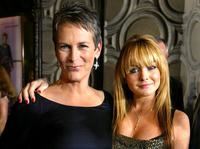 <p>Carlo Allegri/Getty</p> Jamie Lee Curtis and Lindsay Lohan at the premier of 'Freaky Friday' in 2003.