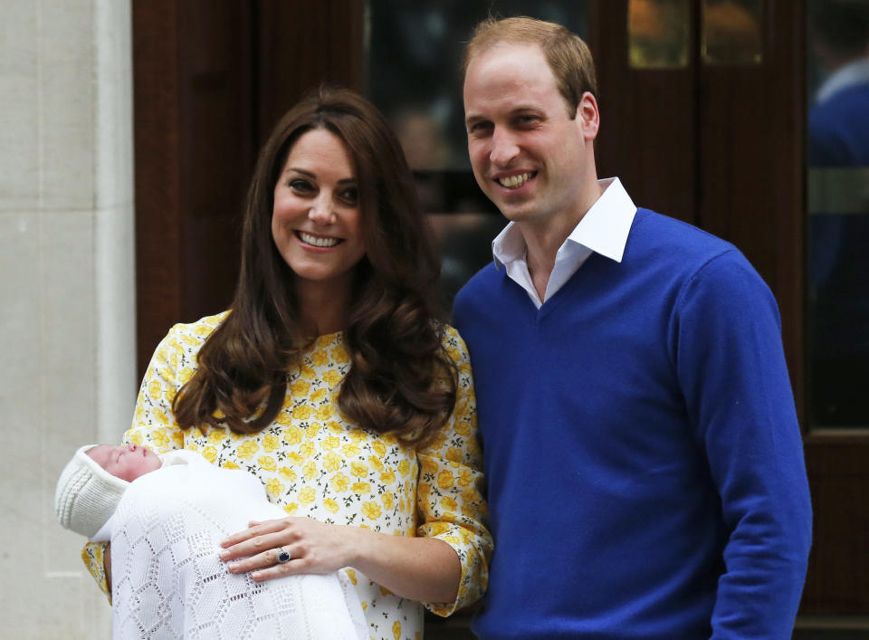 The Duchess of Cambridge and Prince William appear with their second child, a daughter born in 2015.&nbsp; (Photo: Suzanne Plunkett / Reuters)