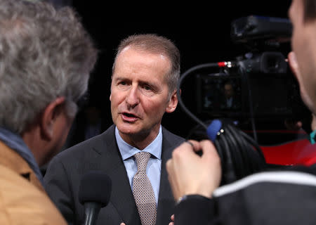 Dr. Herbert Diess, CEO, Volkswagen AG, speaks to members of the media during the reveal of new 2020 Passat at the North American International Auto Show in Detroit, Michigan, U.S., January 14, 2019. REUTERS/Jonathan Ernst