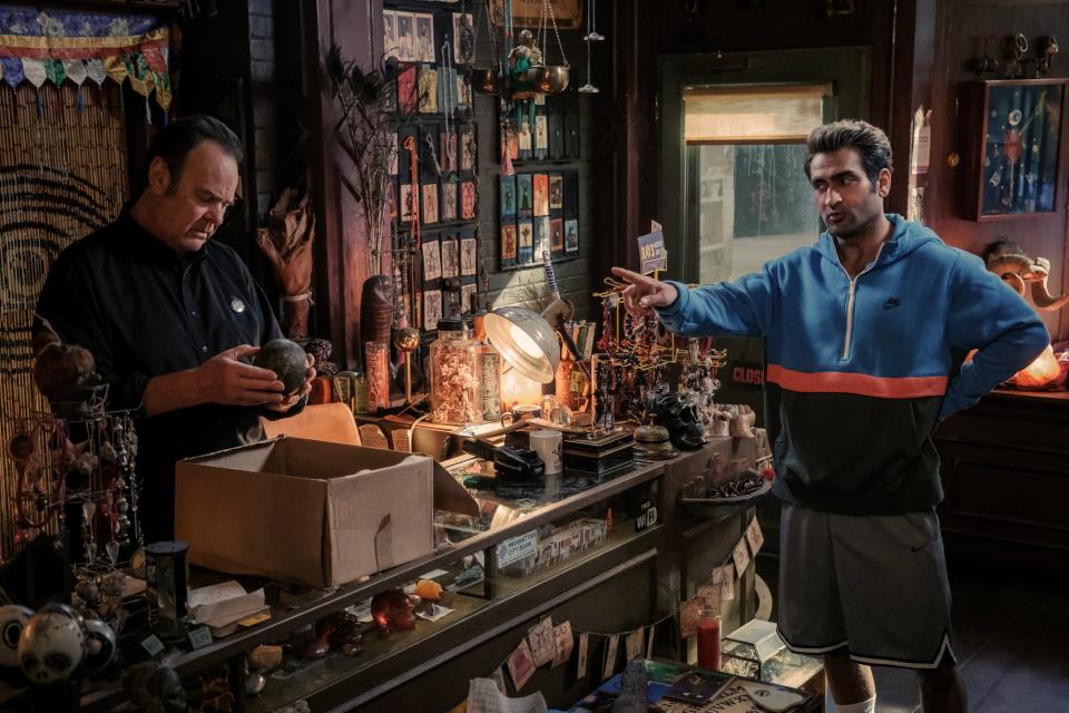 Ray Stantz (Dan Aykroyd, left) checks out a strange orb that Nadeem Razmaadi (Kumail Nanjiani) brings into the occult bookstore in "Ghostbusters: Frozen Empire."