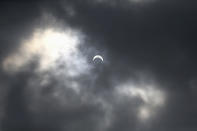 The sun is partially eclipsed in Lagos November 3, 2013. Skywatchers across the world are in for a treat Sunday as the final solar eclipse of 2013 takes on a rare hybrid form. REUTERS/Akintunde Akinleye (NIGERIA - Tags: ENVIRONMENT SOCIETY)