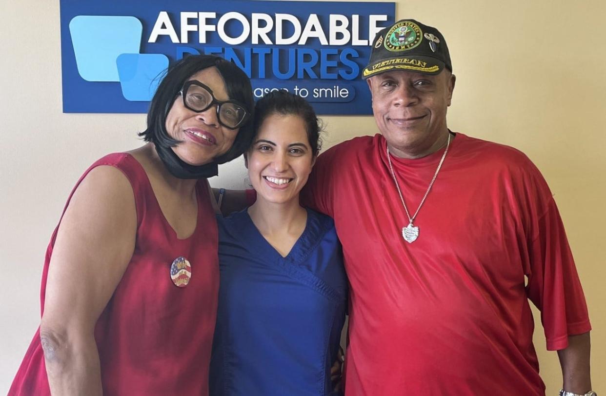 Melvin Huff (right), a U.S. Army veteran, is receiving extensive free dental work as part of the We Care Veterans Program at Affordable Dentures and Implants in Commerce, Georgia. Pictured with Huff is his life partner Denise and Dr. Fatin Jweinat.