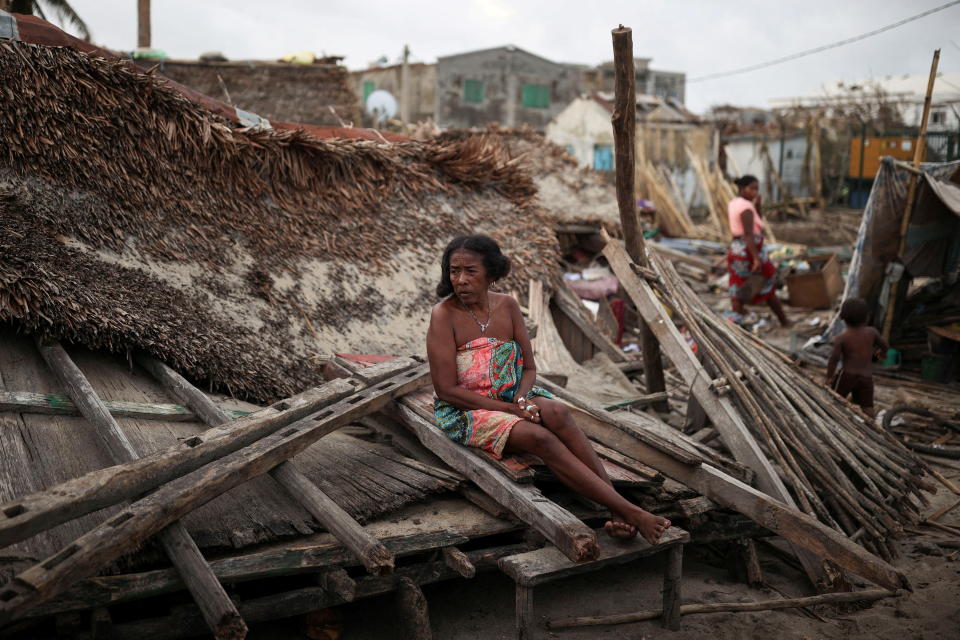 A woman sits on the debris of her destroyed house, in the aftermath of Cyclone Batsirai, in the town of Mananjary, Madagascar, February 7, 2022. REUTERS/Alkis Konstantinidis     TPX IMAGES OF THE DAY