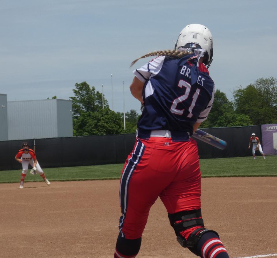 Indian Valley's Gabby Meade gives the Braves a 1-0 lead over Heath Wednesday.