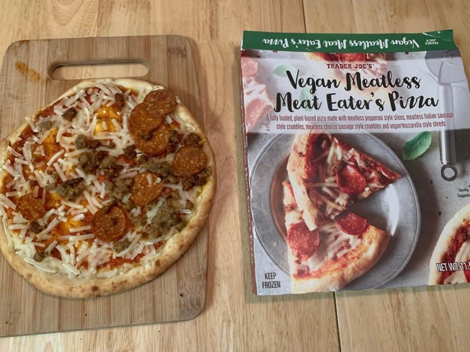 Trader joe's cooked vegan meat pizza beside original box