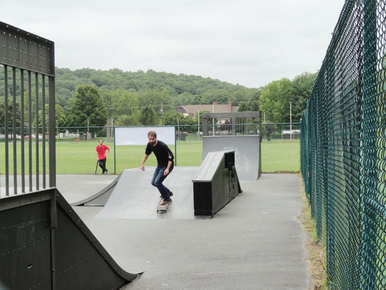 A skateboarding enthusiast uses the Hawley Skate Park in Bingham Park at a "skate jam" event in 2022.