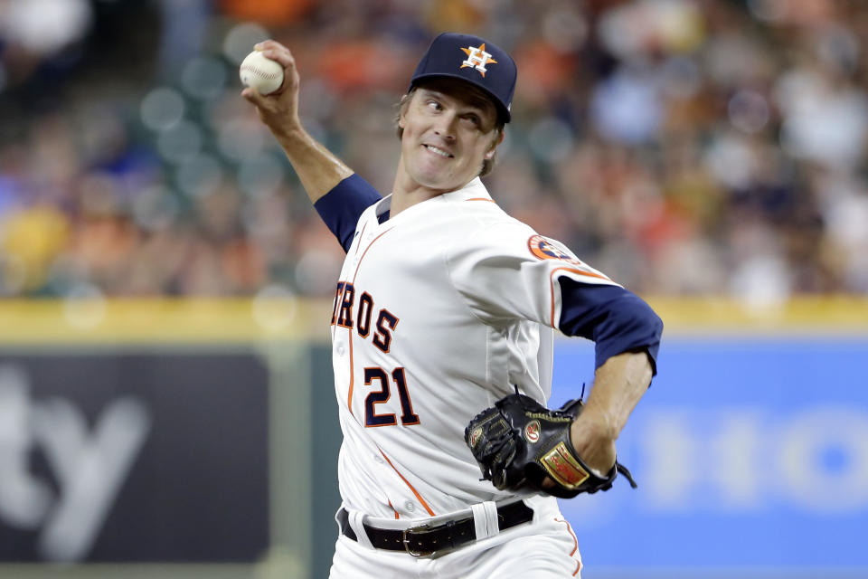 Houston Astros starting pitcher Zack Greinke (21) throws against the Cleveland Indians during the first inning of a baseball game Monday, July 19, 2021, in Houston. (AP Photo/Michael Wyke)