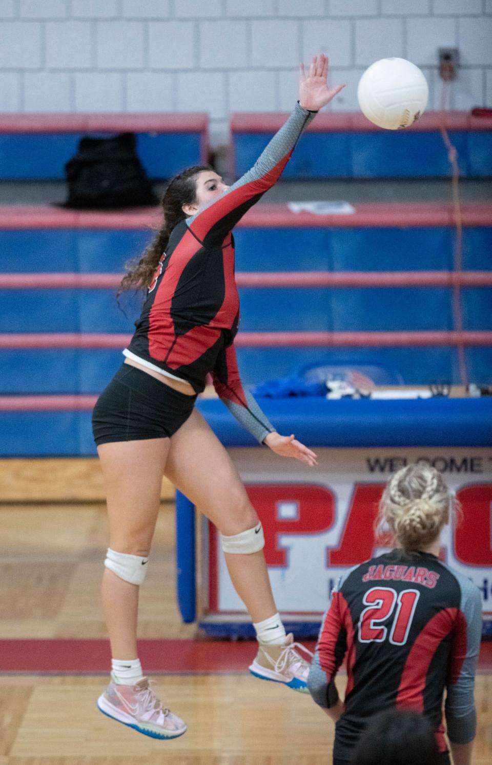 Jaden Gentry (14) plays the ball during the West Florida vs Pace volleyball match at Pace High School on Wednesday, Sept. 6, 2023.