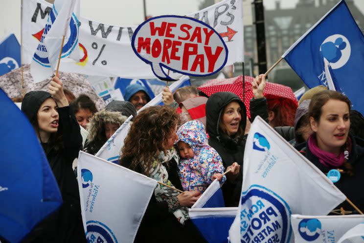 Nurses and midwives stage a protest at poor pay and conditions in 2014 (Peter Macdiarmid/Getty Images)