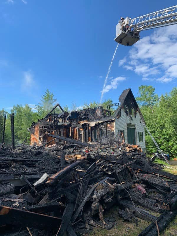 A Milton home was engulfed in flames Wednesday morning on June 29, 2022.