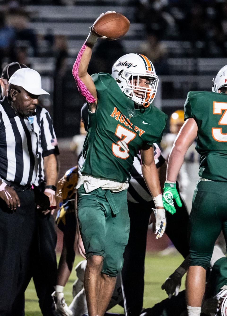 Dolphin junior Isaac Paul celebrates a fumble recovery. Mosley hosted Rickards at Tommy Oliver Stadium Friday, October 15, 2021. The Dolphins came away winners 28-13 to keep their perfect season alive.