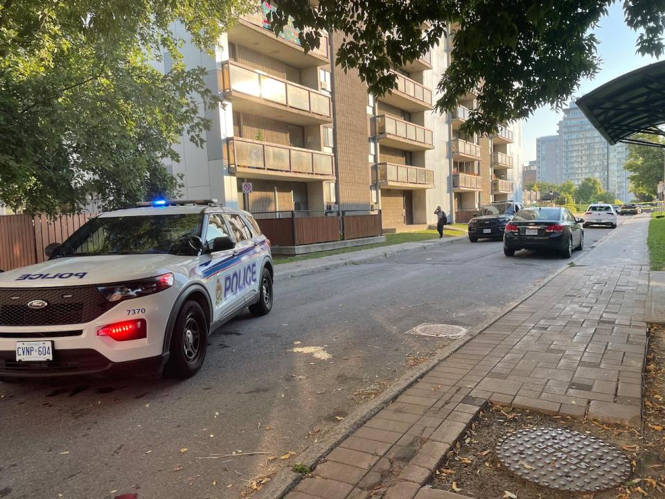 Police vehicles remained on the block of Nepean Street between Bronson Avenue and Percy Street the morning of Sept. 16, 2024 after a fatal shooting nearby the previous night.