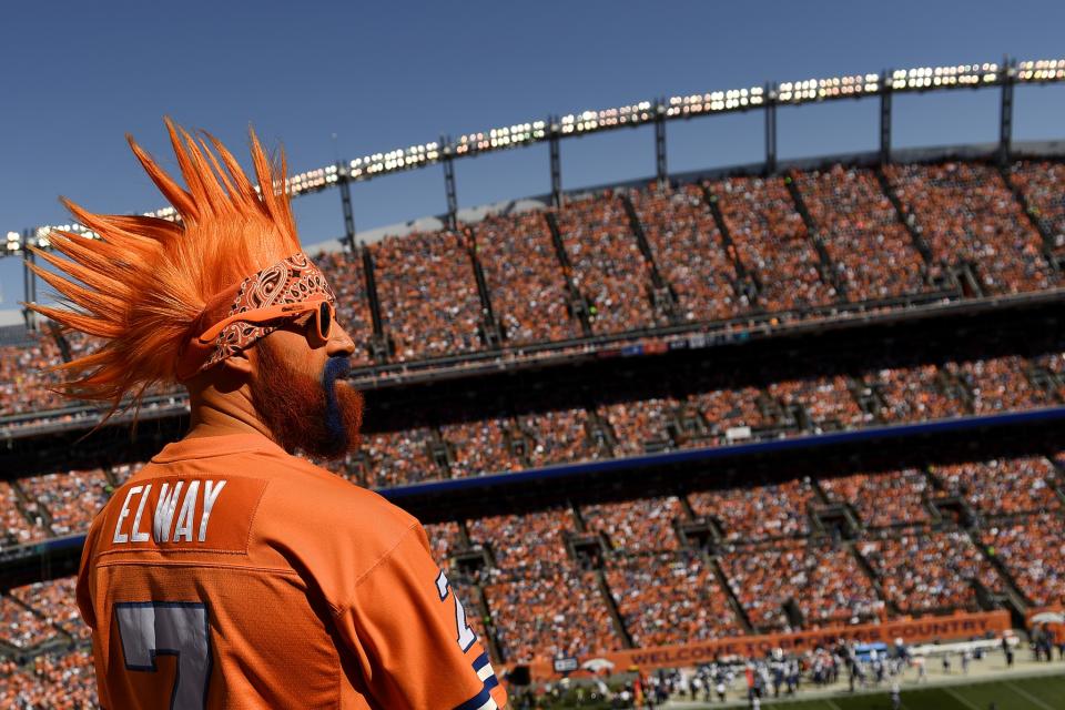 <p>A Denver Broncos fan in a John Elway jersey rocks face paint during the first quarter. The Denver Broncos hosted the Indianapolis Colts on Sunday, September 18, 2016. (Photo by Helen H. Richardson/The Denver Post via Getty Images) </p>
