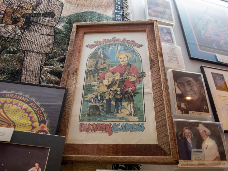 A French poster advertising a past Festivals Acadiens et Creoles hangs on a wall in the Acadian Museum in Erath.
