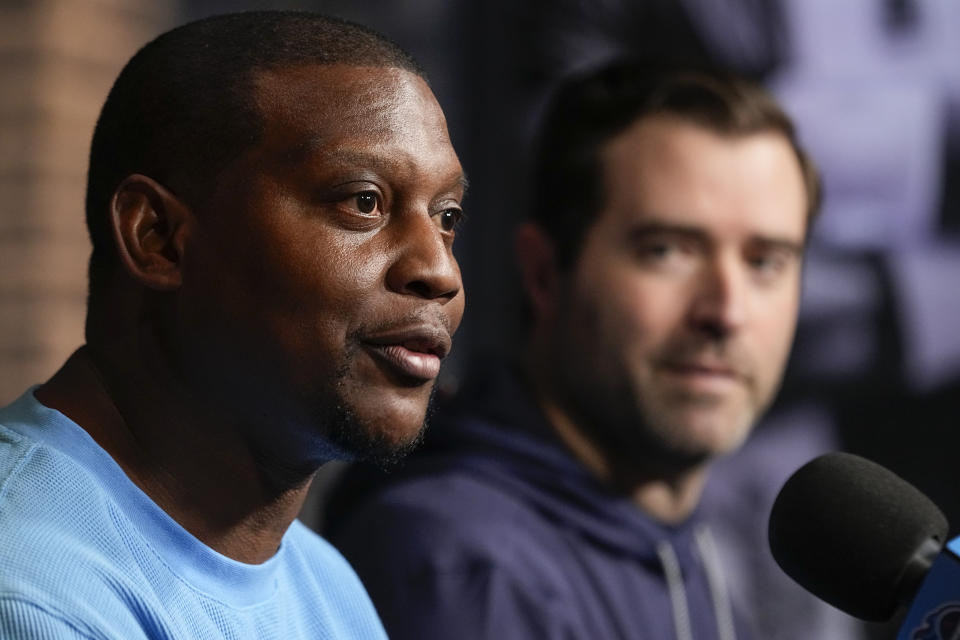 Tennessee Titans defensive coordinator Dennard Wilson, left, responds to questions during a news conference with head coach Brian Callahan at the NFL football team's training facility Wednesday, Feb. 14, 2024, in Nashville, Tenn. (AP Photo/George Walker IV)