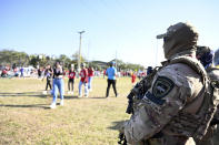 Members of law enforcement stand guard near the entrance to the stadium prior to Super Bowl LV when the Tampa Bay Buccaneers will take on the defending champion Kansas City Chiefs at Raymond James Stadium on February 07, 2021 in Tampa, Florida. (Photo by Douglas P. DeFelice/Getty Images)