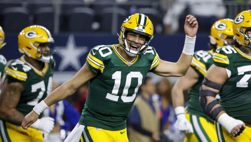 Green Bay Packers quarterback Jordan Love (10) reacts after throwing a touchdown pass against the Dallas Cowboys during the second half of an NFL football game, Sunday, Jan. 14, 2024, in Arlington, Texas. 