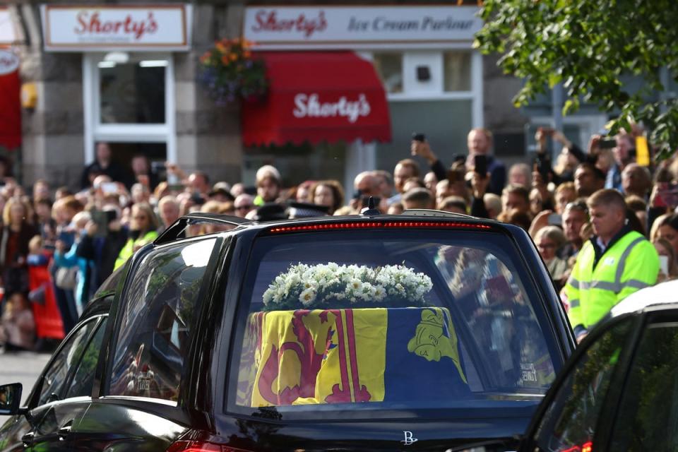 Thousands filled the streets to watch funeral cortege pass by (REUTERS)