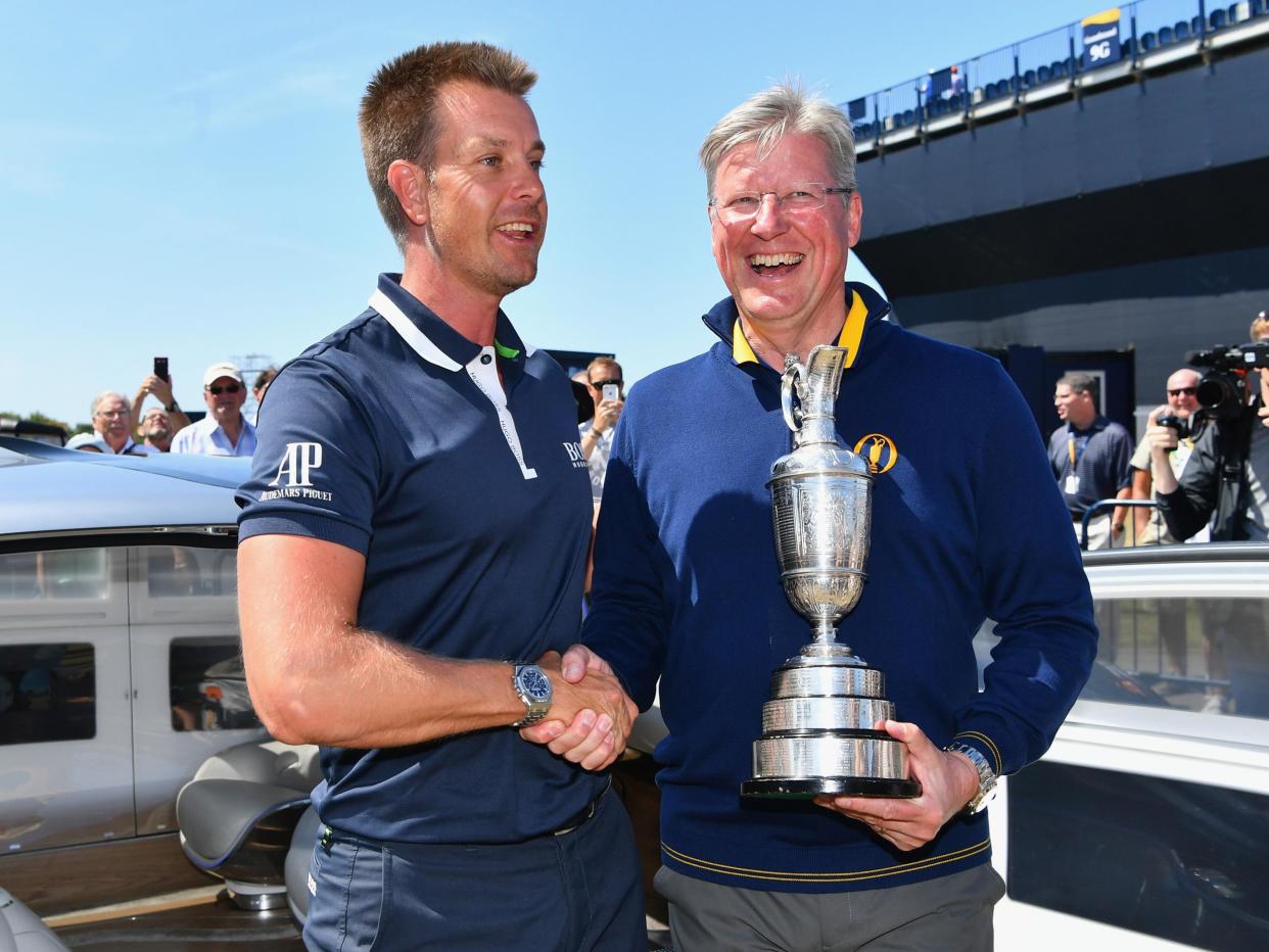 Slumbers, shown here with 2016 winner Henrik Stenson, says the Open is better off on Sky: Getty Images