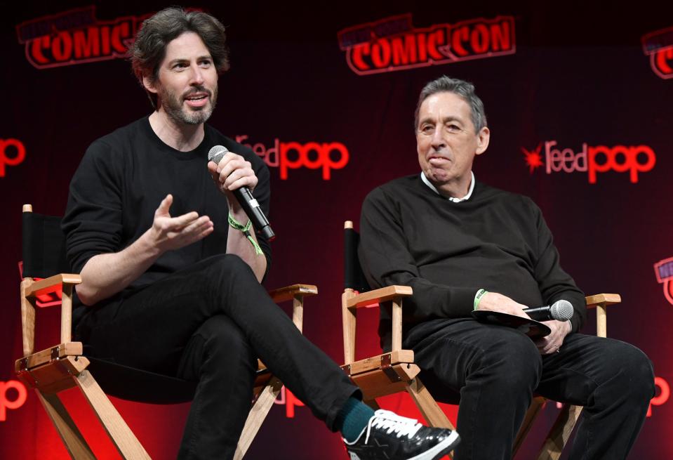 Jason Reitman and Ivan Reitman dressed in black and sitting in chairs