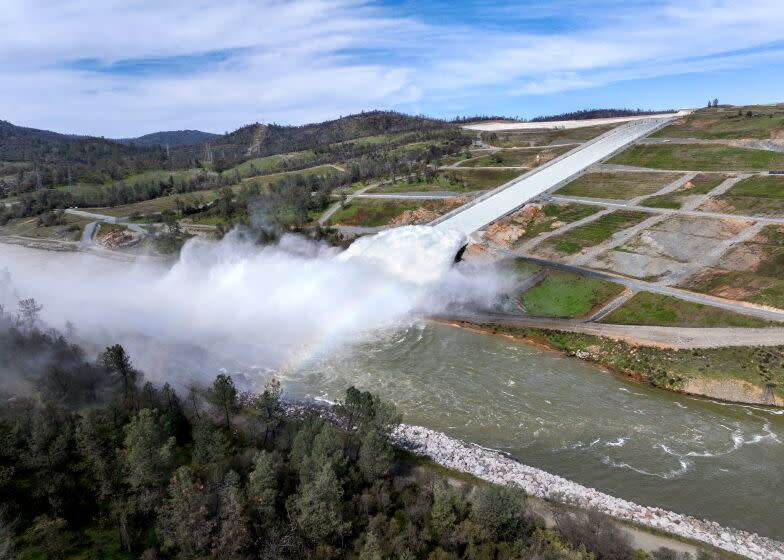 A drone provides an aerial view of a cloud mist formed as water flows over the four energy dissipator blocks at the end of the Lake Oroville Main Spillway. The California Department of Water Resources increased the water release down the main spillway to 35,000 cubic feet per second (cfs) on Friday afternoon. Main spillway releases will continue to manage lake levels in anticipation of rain and snowmelt. Photo taken March 17, 2023. Ken James / California Department of Water Resources