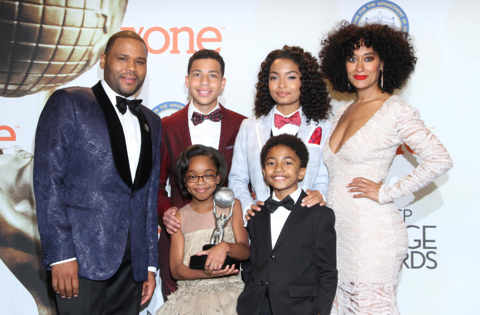 Anthony Anderson, from left, Marcus Scribner, Marsai Martin, Yara Shahidi, Miles Brown, and Tracee Ellis Ross pose in the press room with the award for outstanding comedy series for "Black-ish" at the 46th NAACP Image Awards at the Pasadena Civic Auditorium on Friday, Feb. 6, 2015, in Pasadena, Calif. (Photo by Arnold Turner/Invision/AP)