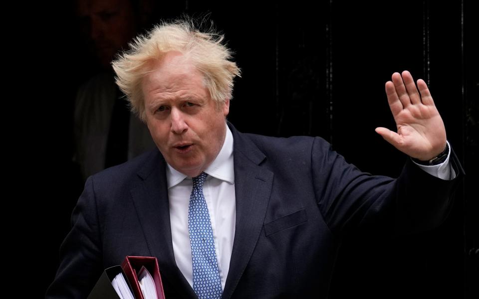 Boris Johnson, the former prime minister, is pictured leaving 10 Downing Street on May 25 last year - Matt Dunham/AP