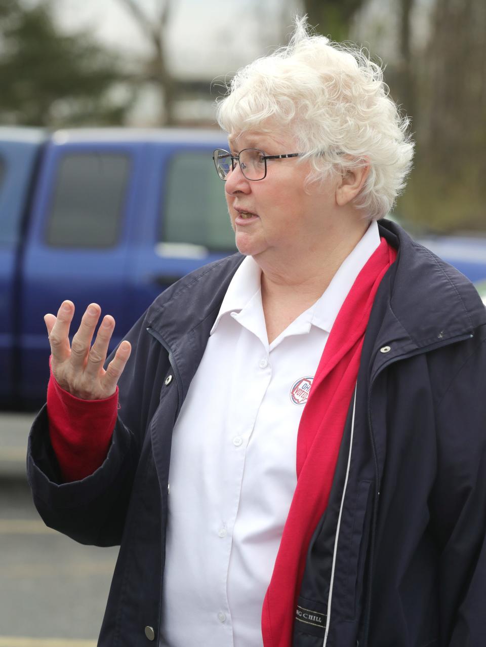 Blanche Reynolds talks about her ballot selections outside the Connect Church on Tuesday in Coventry Township.