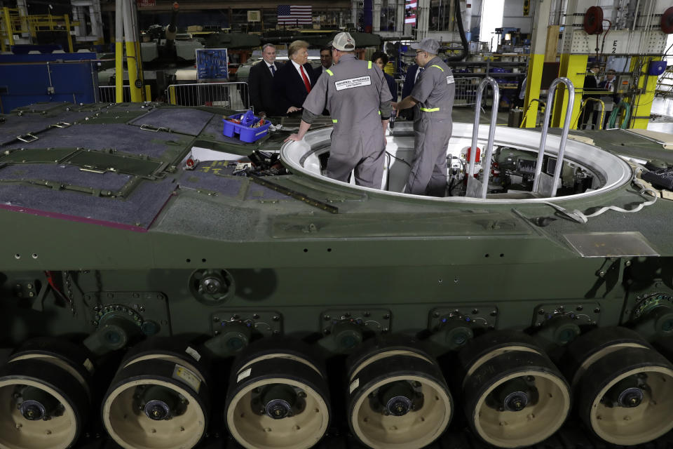 President Donald Trump takes a tour of the Lima Army Tank Plant, Wednesday, March 20, 2019, in Lima, Ohio. (AP Photo/Evan Vucci)