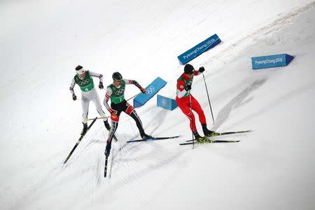 Nordic Combined Events - Pyeongchang 2018 Winter Olympics - Men's Team 4 x 5 km Final - Alpensia Cross-Country Skiing Centre - Pyeongchang, South Korea - February 22, 2018 - Hideaki Nagai of Japan, Lukas Klapfer of Austria and Espen Andersen of Norway compete. REUTERS/Carlos Barria